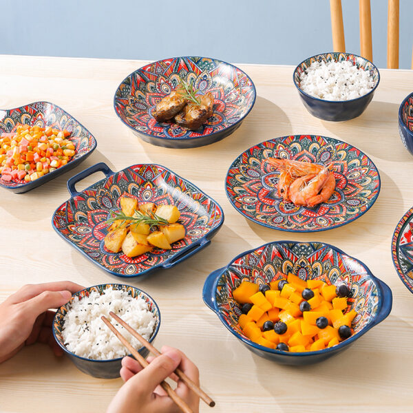 An open table arrangement of a wholesale bohemian dinnerware set showing mandala pattern ceramic bowls with handles and baking dishes.