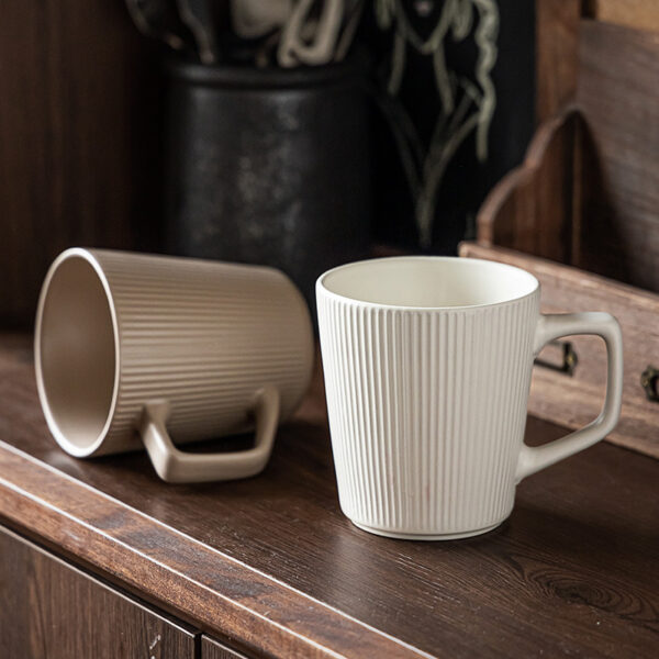 Detailed view of the ergonomic square handle on our high-quality ceramic coffee mugs