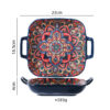 Top and side view of a wholesale square ceramic baking dish with handles showing 23cm length, 18.5cm width, and 593g weight.