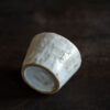 handmade-japanese-tea-cup-detail Handmade Japanese stoneware tea cup wholesale showing artisan craftsmanship