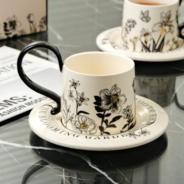 black-handle-ceramic-coffee-cup-detail Ceramic coffee cup with glossy black handle detail