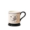 vintage-floral-ceramic-coffee-mug-white-background Vintage black and white floral ceramic coffee mug on white background