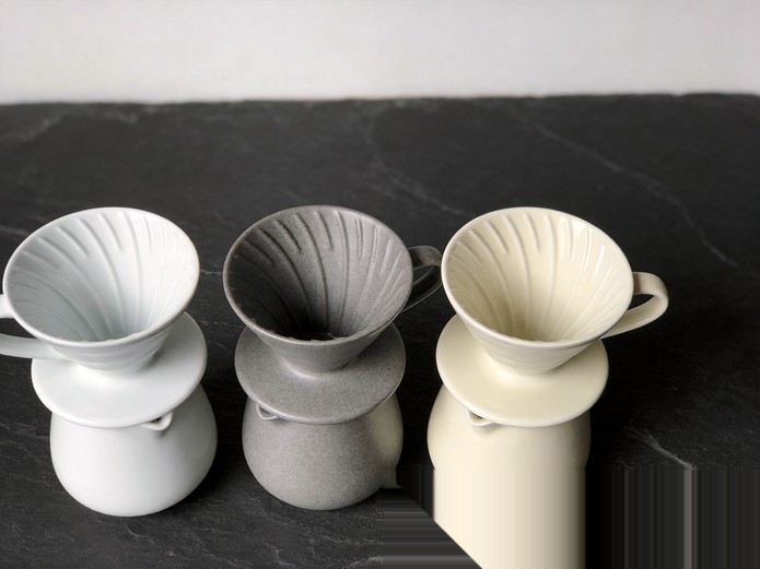 Ceramic Coffee Dripper: B2B Sourcing Guide for Cafes 2 three ceramic coffee drippers in different materials side by side on slate surface for B2B material comparison