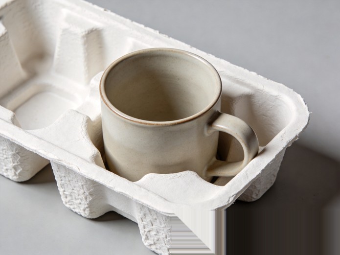 subscription box ceramic packaging with molded pulp tray protecting stoneware mugs during last-mile delivery