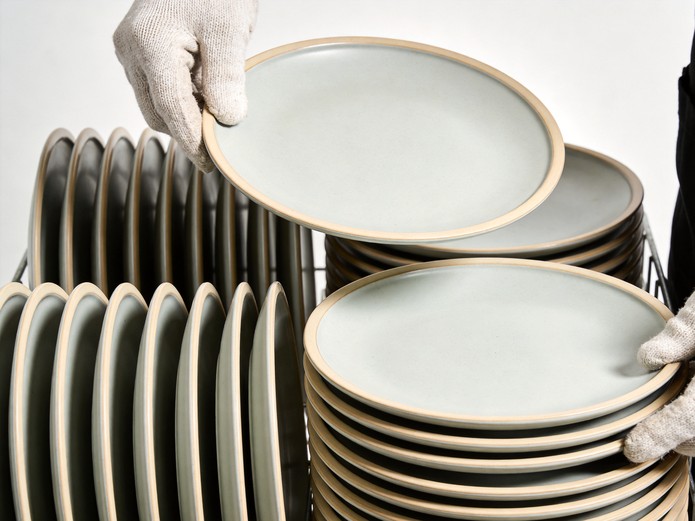 bakery display plates being quality inspected for edge finish and glaze durability