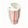 Side view of large ceramic tumbler with straw