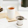 Magnolia pattern ceramic tea mug with deep tea infuser