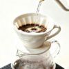 V60-style ceramic coffee dripper showing ribbed interior