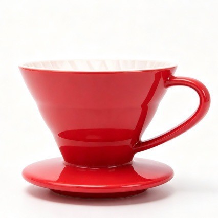 V60-style ceramic coffee dripper showing ribbed interior