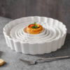 White ceramic pie and quiche dish