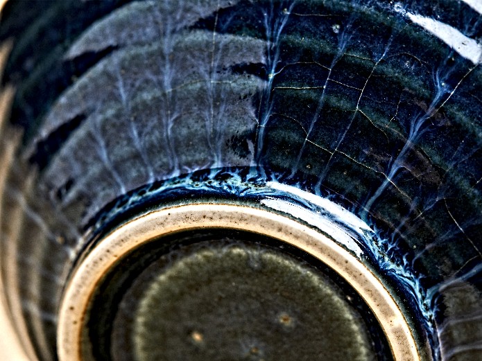 close-up of ceramic ramen bowl glaze texture and rim detail