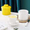 classic-white-ceramic-butter-crock French ceramic butter bell with embossed design