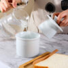 White ceramic French butter crock