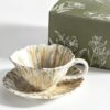Reactive glaze ceramic cup and saucer set for café and hospitality use