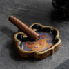 Ceramic cigar ashtray